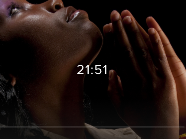 A woman in contemplative prayer