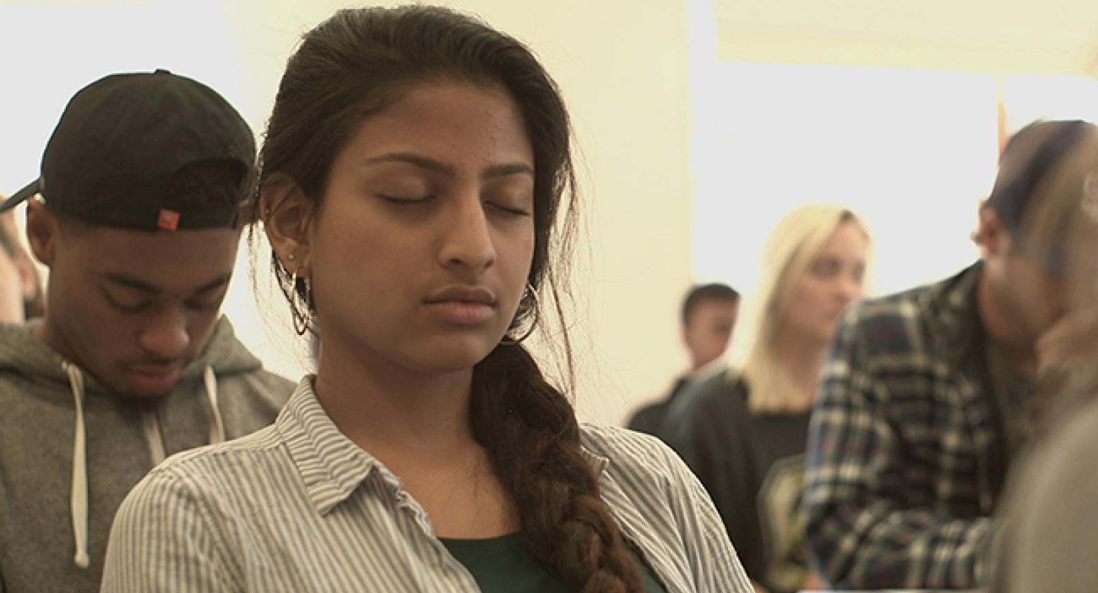 Students participating in one of the contemplative practices.
