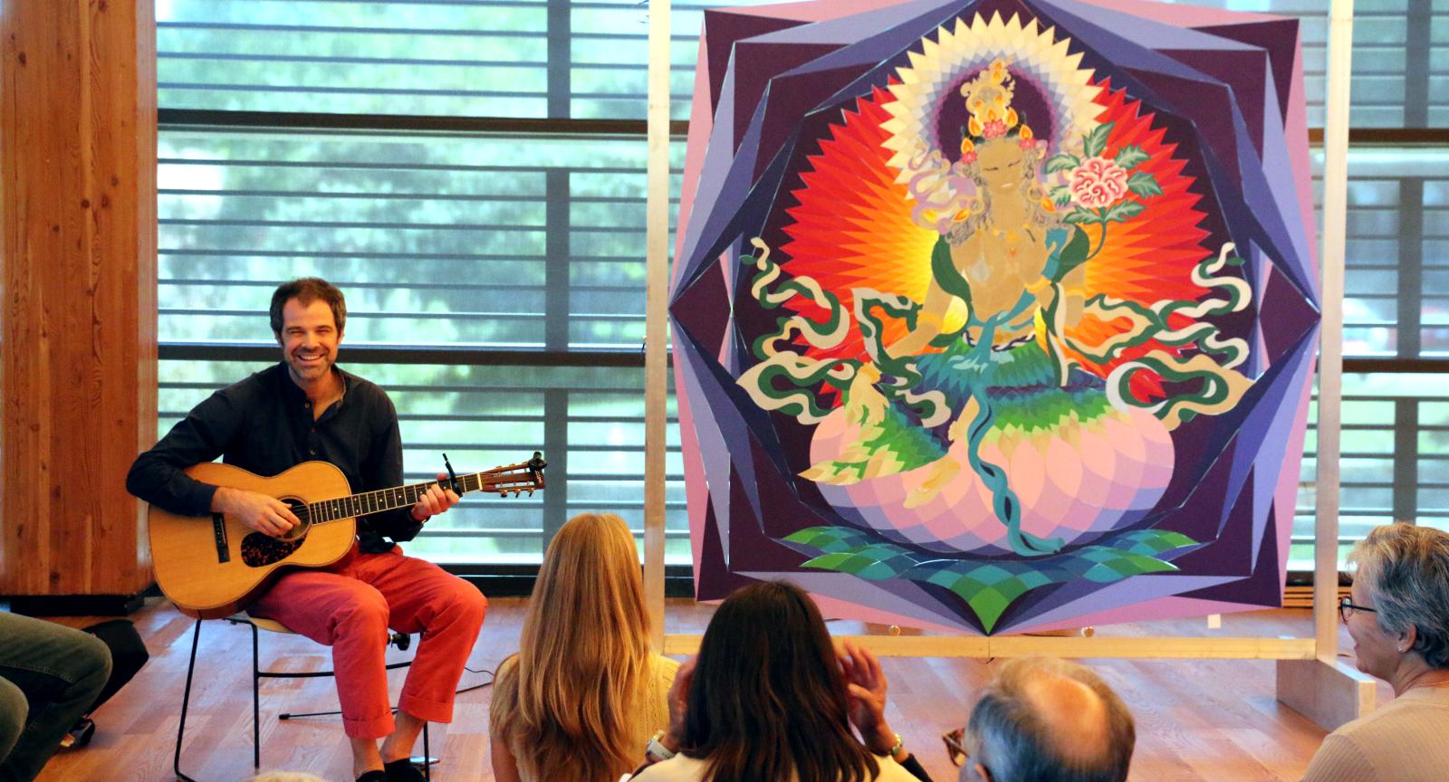 David Glowacki presents his painting of Tara Pancamama