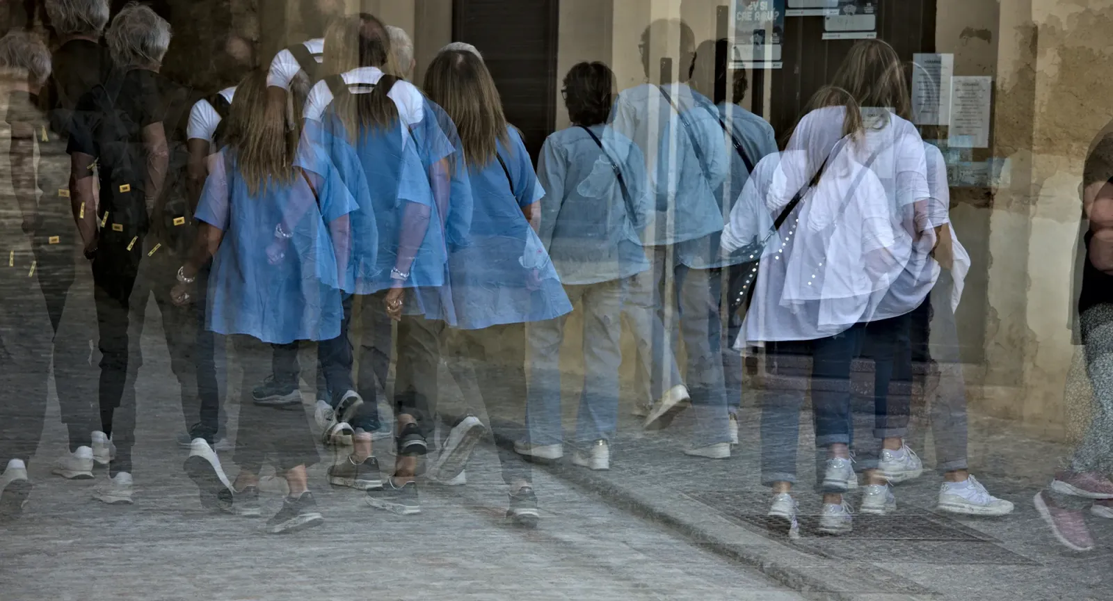 Blurred image of students rushing to class