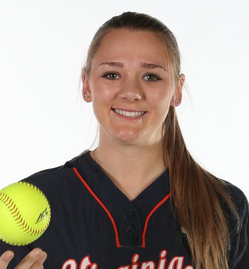 Portrait of Morgan Murphy in uniform tossing a softball