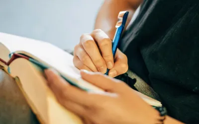 A student writing in a journal