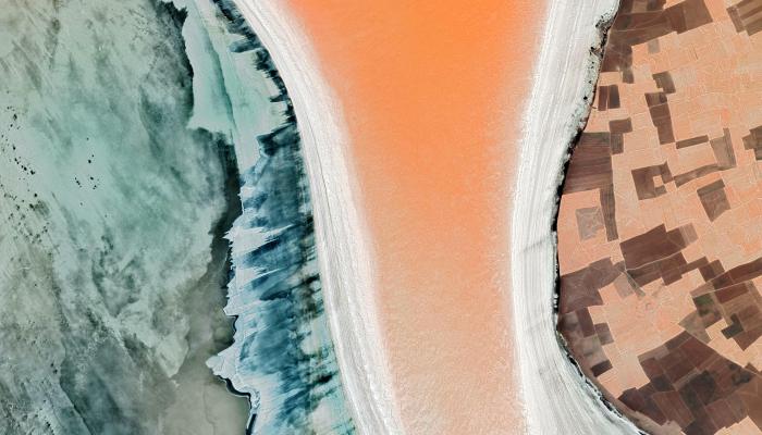 Abstract art in green, orange, and brown