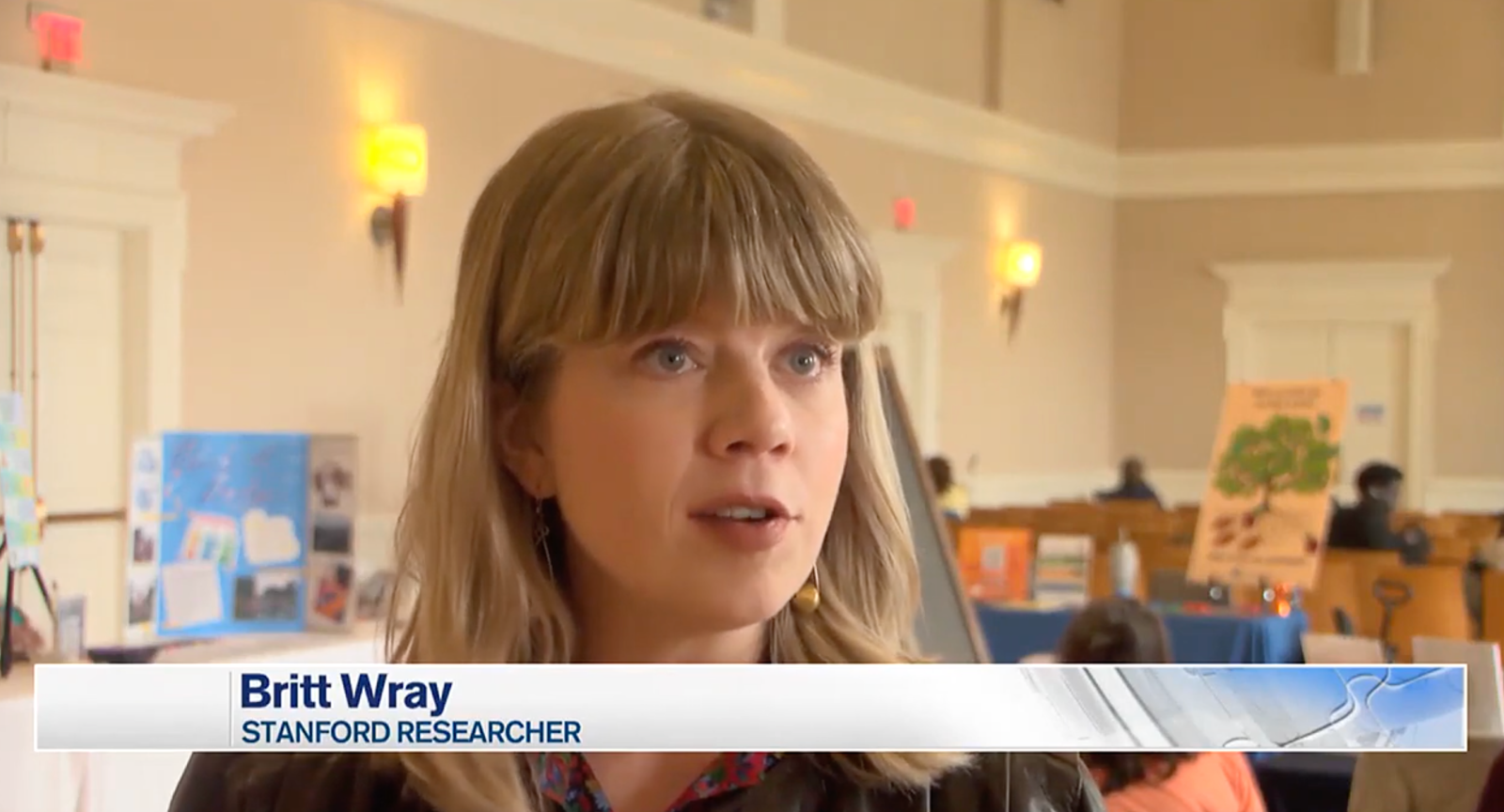 A still from the news interview with Britt Wray