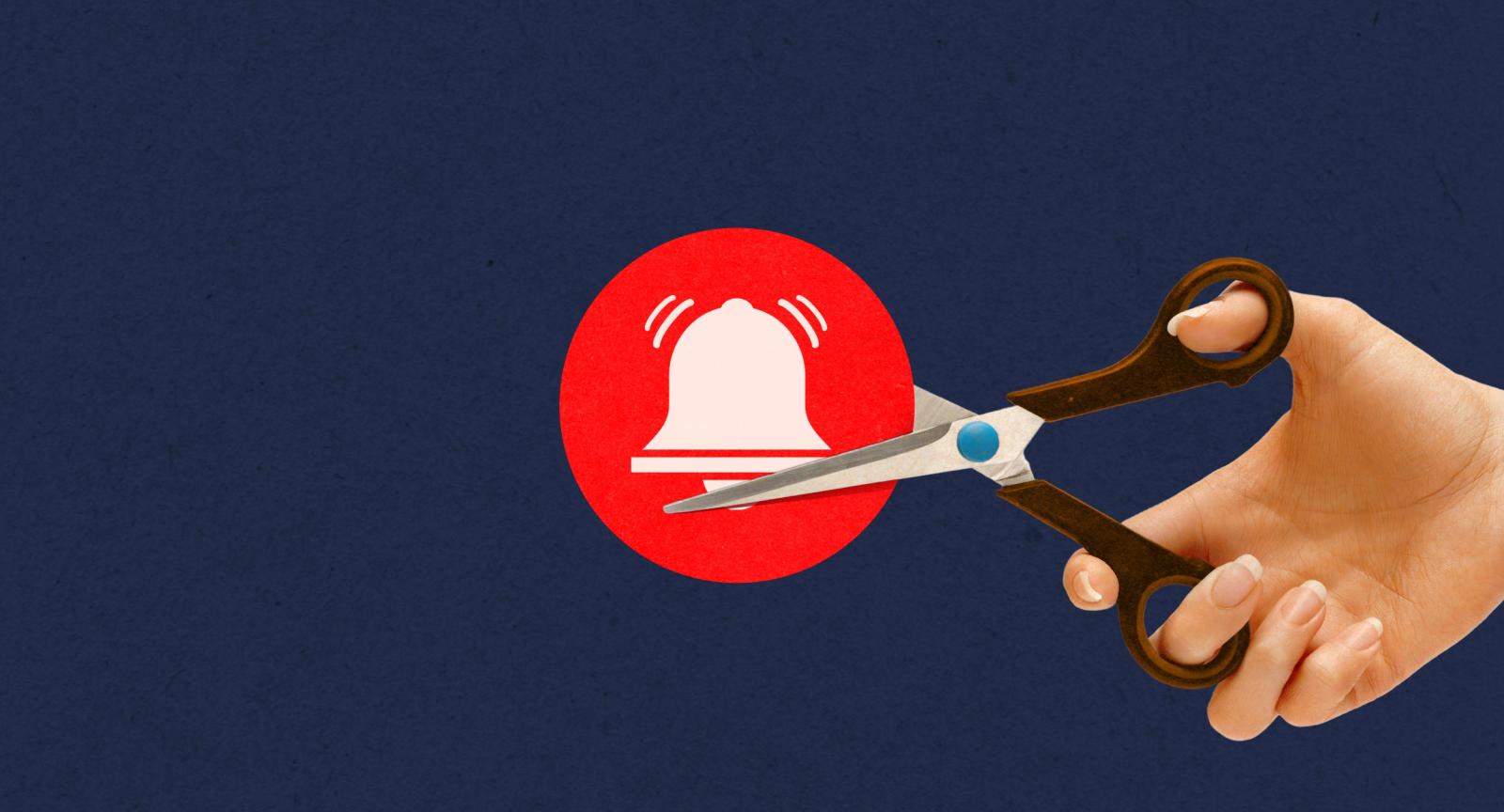 Image of Scissors cutting a ringing phone icon of a bell