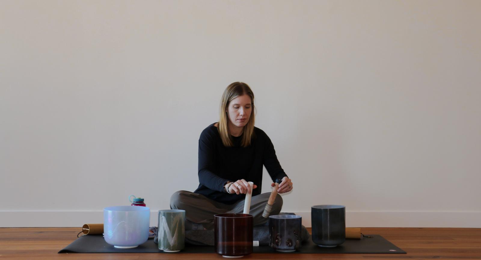 Karianne Michelle performing a Sound Bath in the Contemplative Commons. 