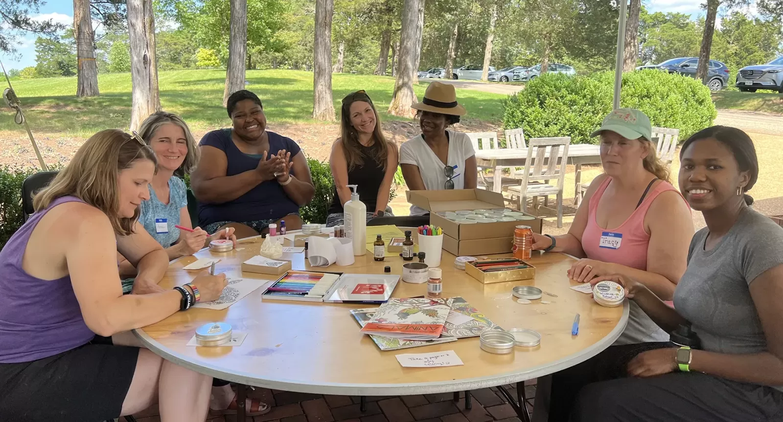 A group of CSP Educators sitting around a table outside