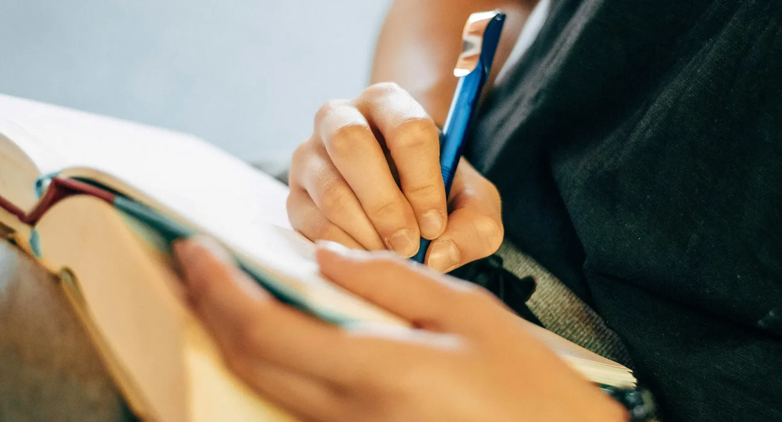 A student writing in a journal