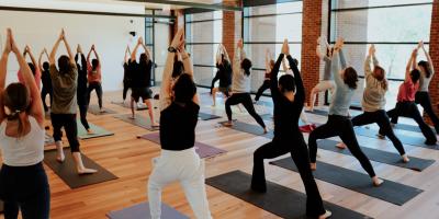 yoga class yoga pose hands above head