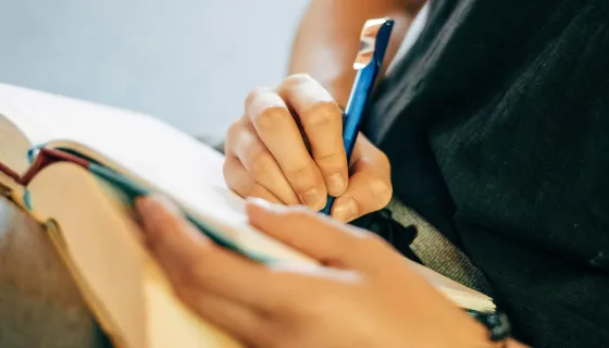 A student writing in a journal