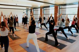 yoga class yoga pose hands above head