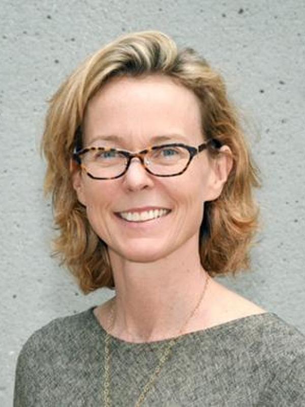 Headshot of Nina Brown de Clercq