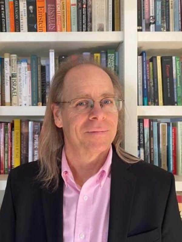 Headshot of Kurtis Schaeffer in his office