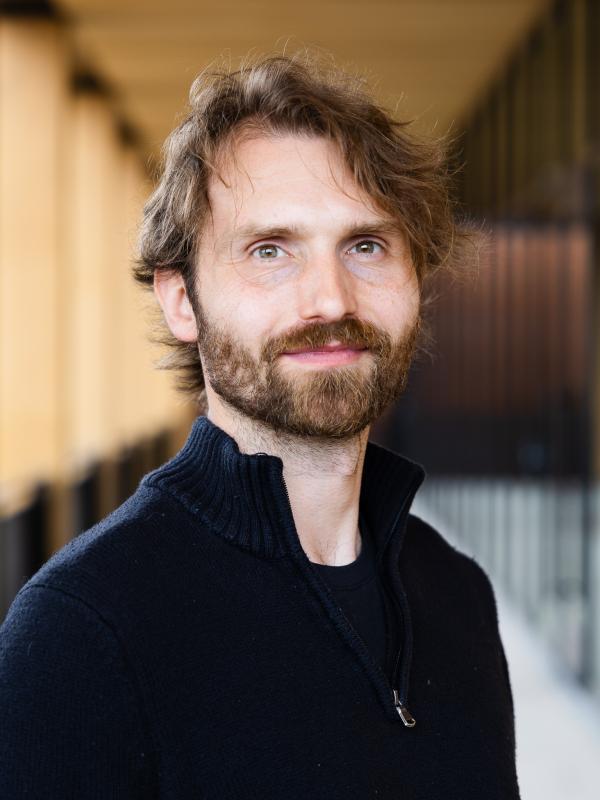 Adam Little's headshot, taken in the Contemplative Commons