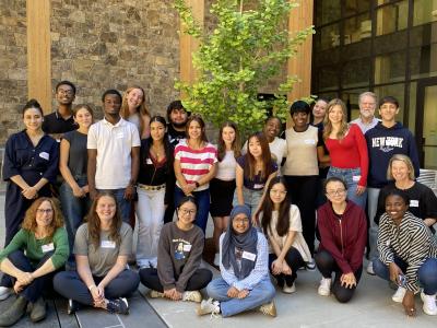 The Citizen Leader Fellows, a group of students, standing in the Contemplative Commons courtyard.