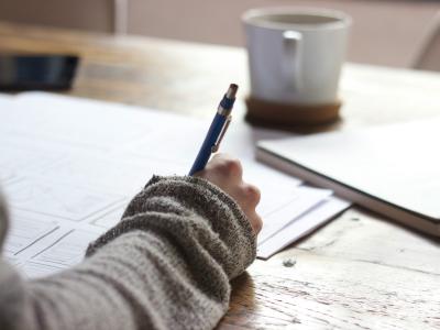 Person writing stock photo Unsplash