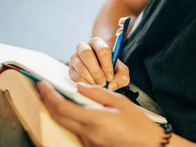 A student writing in a journal